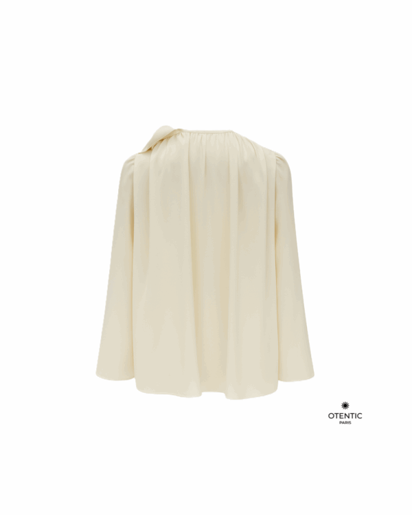 Blouse fluide blanche avec détail floral dos