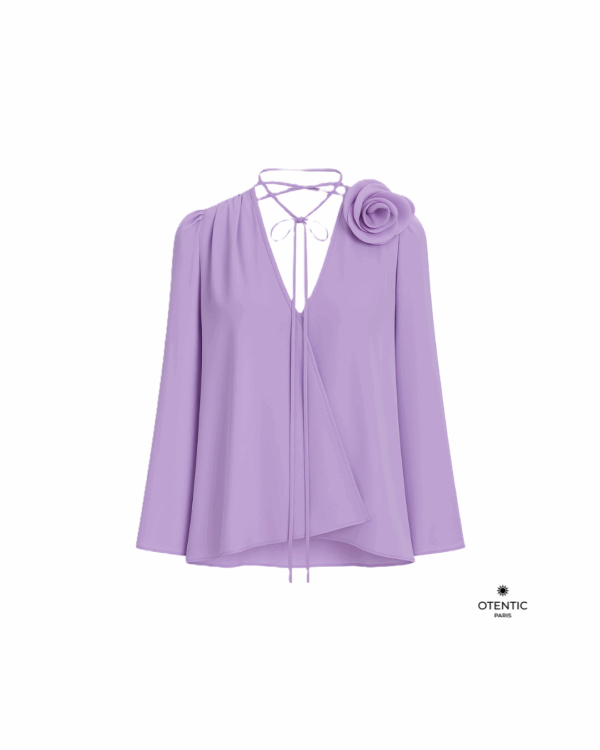 Blouse fluide blanche avec détail floral violet